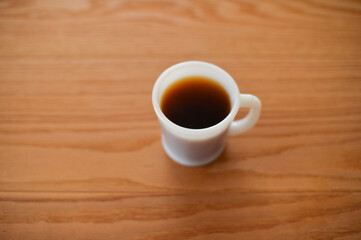 シンプルなコーヒーとコーヒーカップの写真
