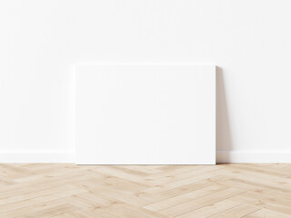 Blank white horizontally oriented rectangular exhibition background leaning on white wall. Wooden parquet floor. 3D illustration.