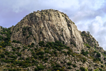 Rocky mountain landscape, vertical wall for climbing. Pico de la Miel. The Cabrera.
