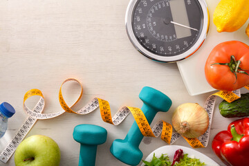 Healthy food and sport background on table with scale top
