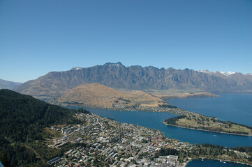 Queenstown from above with a blue sky