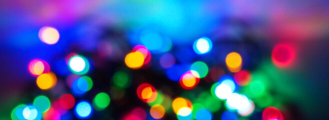 Bokeh of christmas garland. Lights of garland in bokeh.