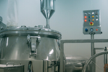 Operator work and fill substance in package machine in factory.