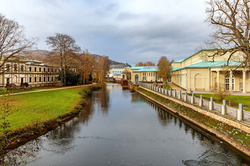Fototapeta na wymiar A promenade along a river channel in Bad Kiesseng, Germany.