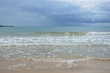 Ravda, Bulgaria. May 20 2014. calm Black Sea with clear water under storm clouds