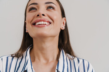 laughing beautiful brunette girl smiling and looking upward