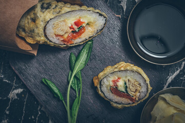 Still life. Japanese cuisine- roll in a package