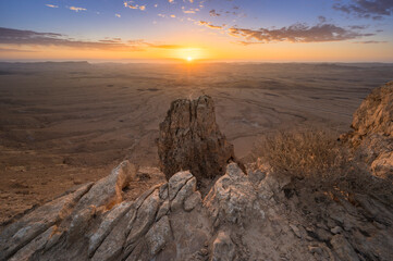 Beautiful landscape with cloudy sunrise over Machtesh Ramon (Ramon Crater), Negev Desert, Israel