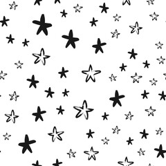 Hand drawn stars seamless texture pattern. Star doodles.