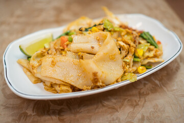 Fototapeta na wymiar Detail shot of Asian food dish of fried noodles