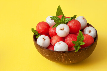 Bowl of fruit salad with watermelon and lychee