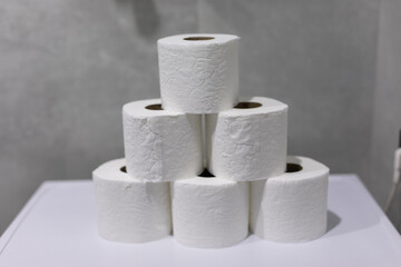 Rolls of toilet paper in bathroom at home