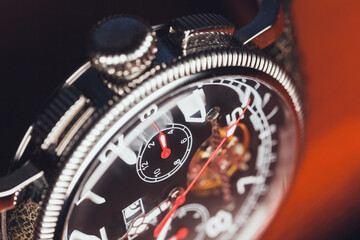 Mechanic wrist watch, closeup fragment photo
