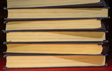 books lying on top of each other.