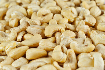 Cashew close up. Texture of nuts. Lots of nuts in a pile.