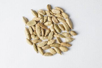 dried cardamom seeds isolated on white