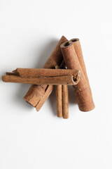cinnamon sticks isolated on white