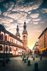 Naklejka na ściany i meble Half-timbered houses in Germany. Historic city center, marketplace without people. Wheel house, streets recorded during the day with rain clouds and like in the Middle Ages
