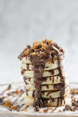 Homemade pancakes with chocolate syrup and chocolate chip