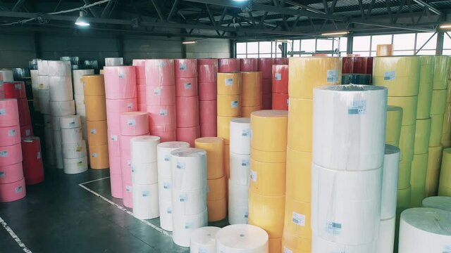 Storage space of a paper-manufacturing factory with paper rolls