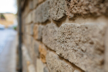 Photo A grey stone wall on the right