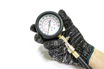 Man hand with compression meter on white background, Isolated, Car maintenance service.