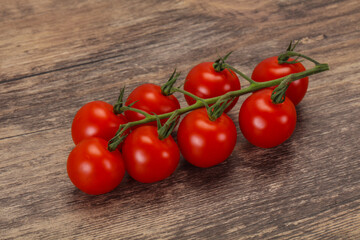 Ripe tomatoes on the branch