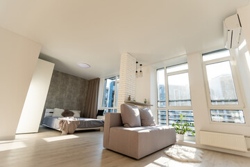 Sofa with pillows in room