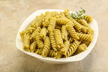 Italian pasta Fusilli with pesto
