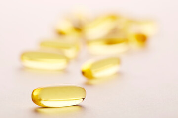 Fish oil supplements on  white.