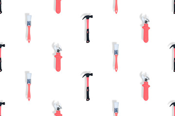 Tools seamless pattern. Tools: construction brushes, hammer, wrench on a white background.