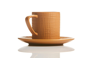 cup and saucer on white