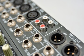 Audio line-in on a mixing console, close-up.