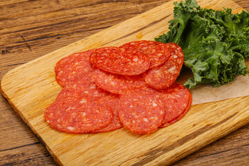 Italian spycy pepperoni sausage slices