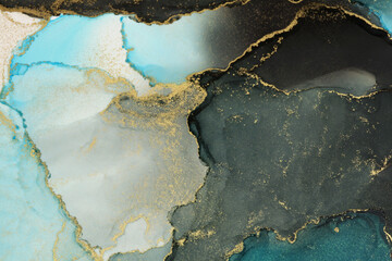 Art Abstract painting blots horizontal background. Alcohol ink blue and gold colors. Marble texture.