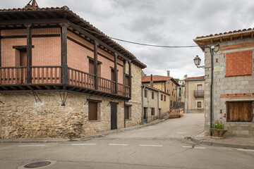 Fototapeta na wymiar a street in Cabrejas del Pinar town, province of Soria, Castile and Leon, Spain 