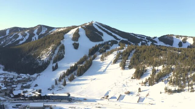 aerial of beautiful ski resort during the sunrise in colorado with a drone