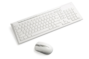 White wireless computer mouse and keyboard 