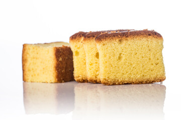 Butter cake sliced on white background