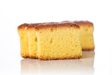 Butter cake sliced on white background