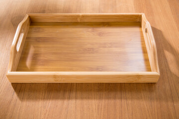 wooden tray on wooden table.
