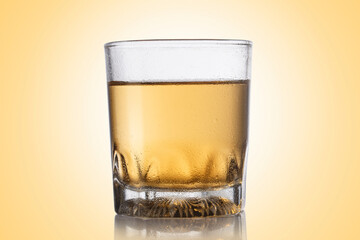 Glass of whiskey in studio shoot.