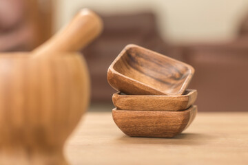 Dishes from the olive tree on wooden table.