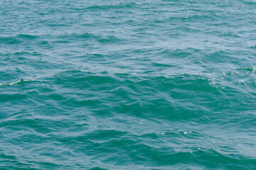 Obraz premium sea wave close up. Ripple on the surface background
