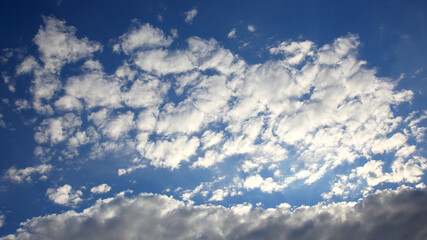 white clouds in the blue sky