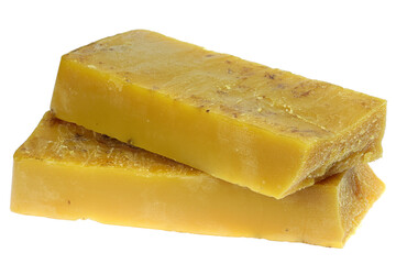 pure beeswax ingot isolated on white background