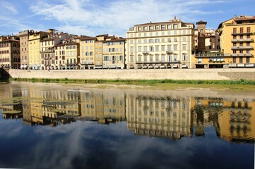 Fototapeta na wymiar Florence reflections in Arno, Italy, 2014