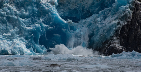 Tracy Arm, Alaska is one of the few places in North America where glaciers still meet the sea. The Sawyer Glacier frequently calves ice into the arm.