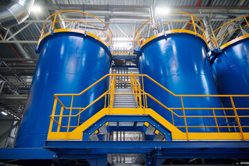 Symmetry oil tanks on a factory