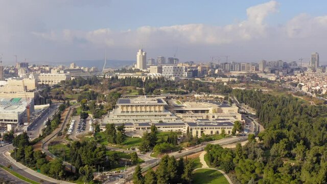 Aerial view of the Knesset, The Israeli house of Parliament, located in Jerusalem, with city rooftops in the horizon.